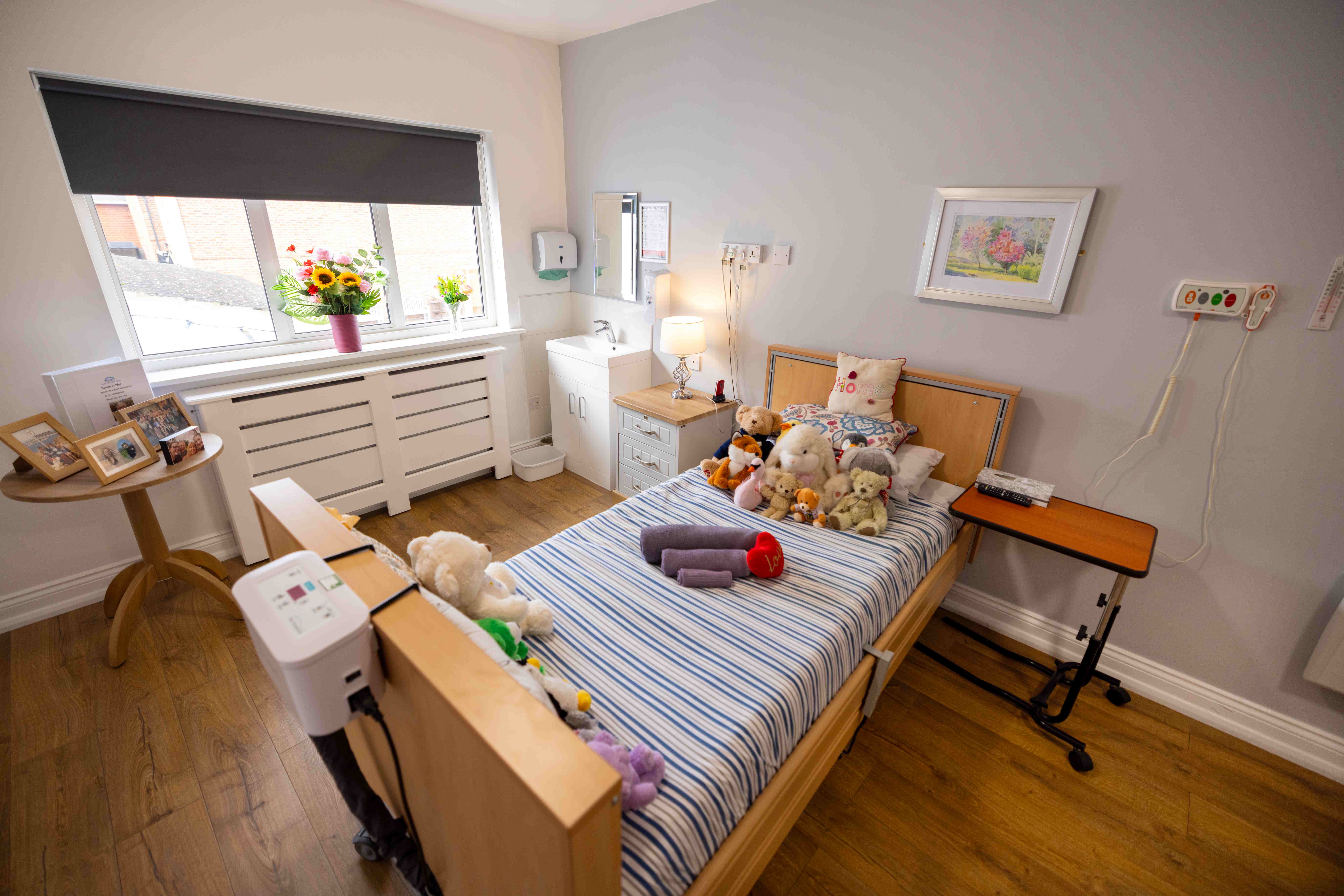 Cozy bedroom with personal touches and flowers