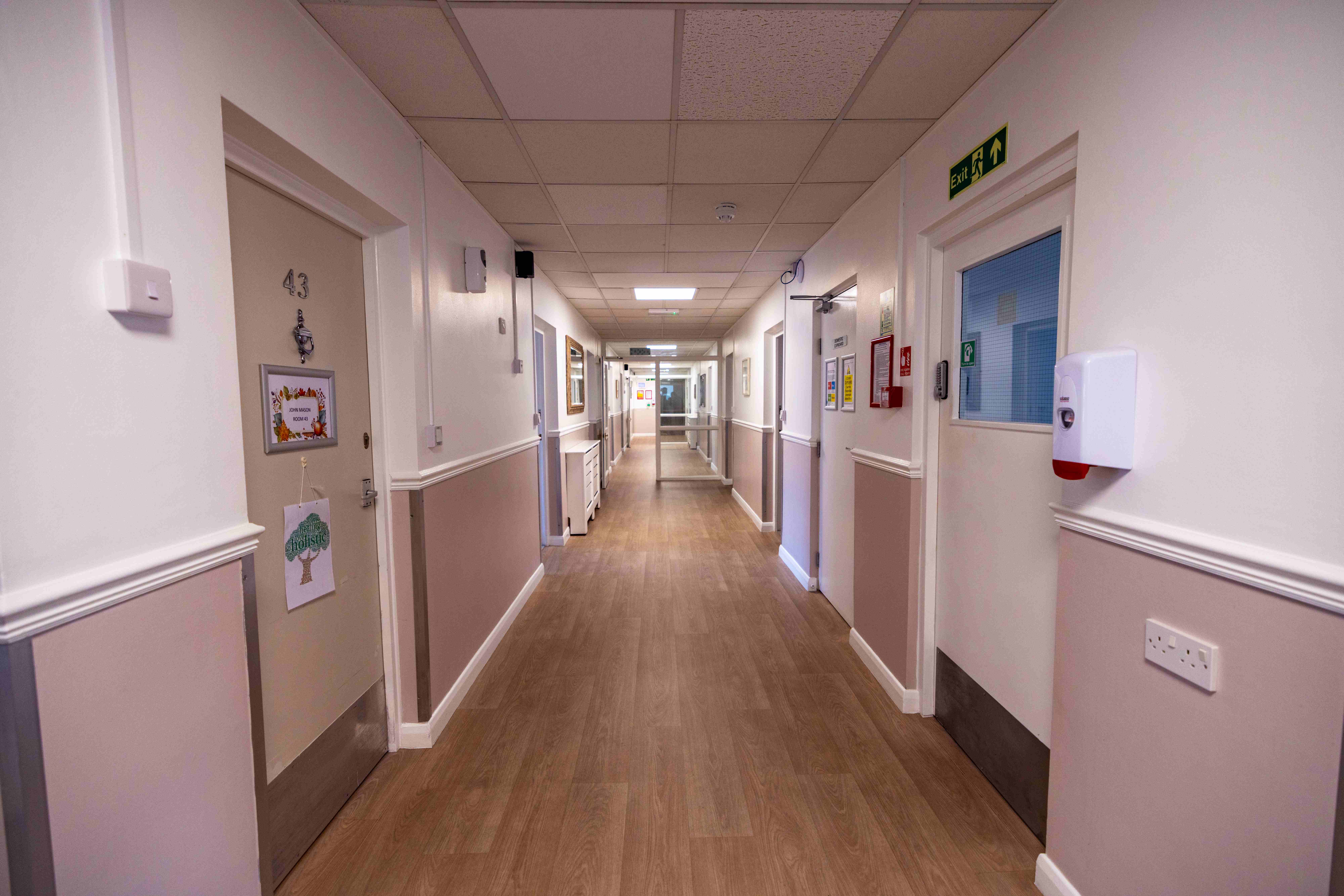 Residential corridor with room doors
